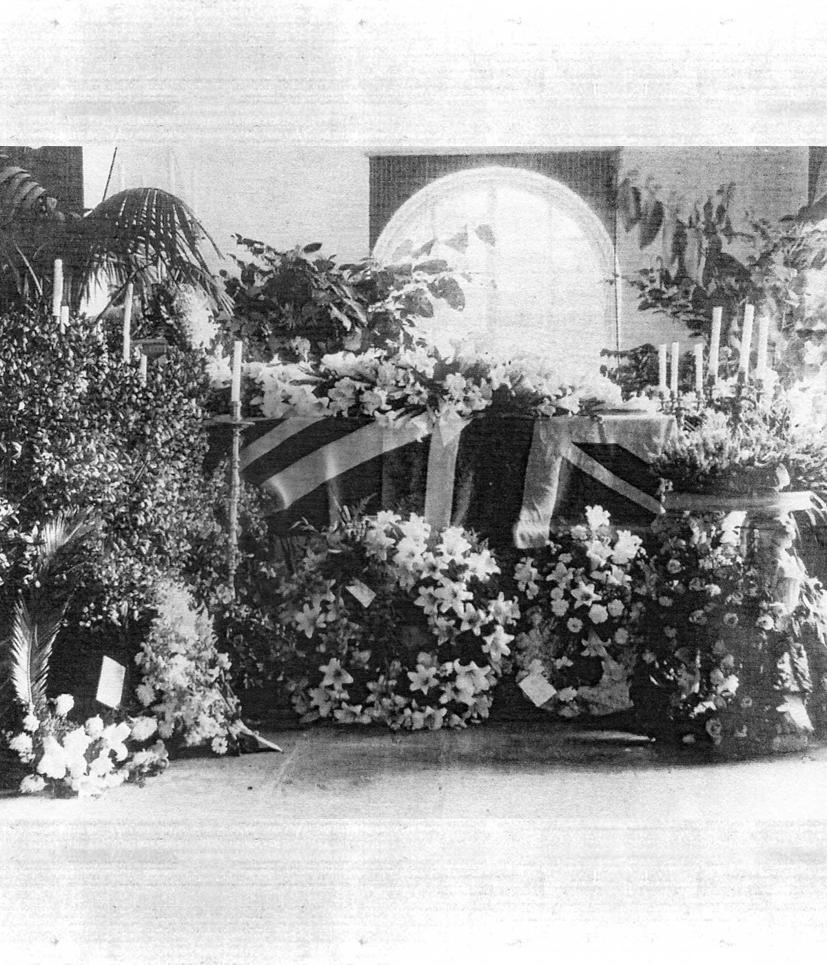 Francis' coffin with flower tributes
