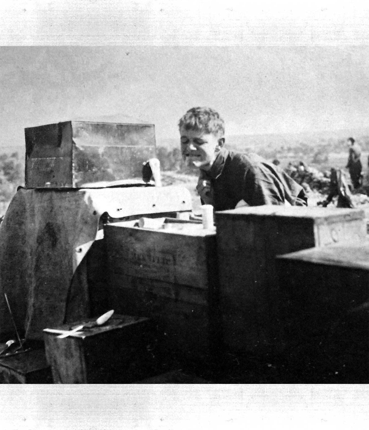 Francis shaving by the car